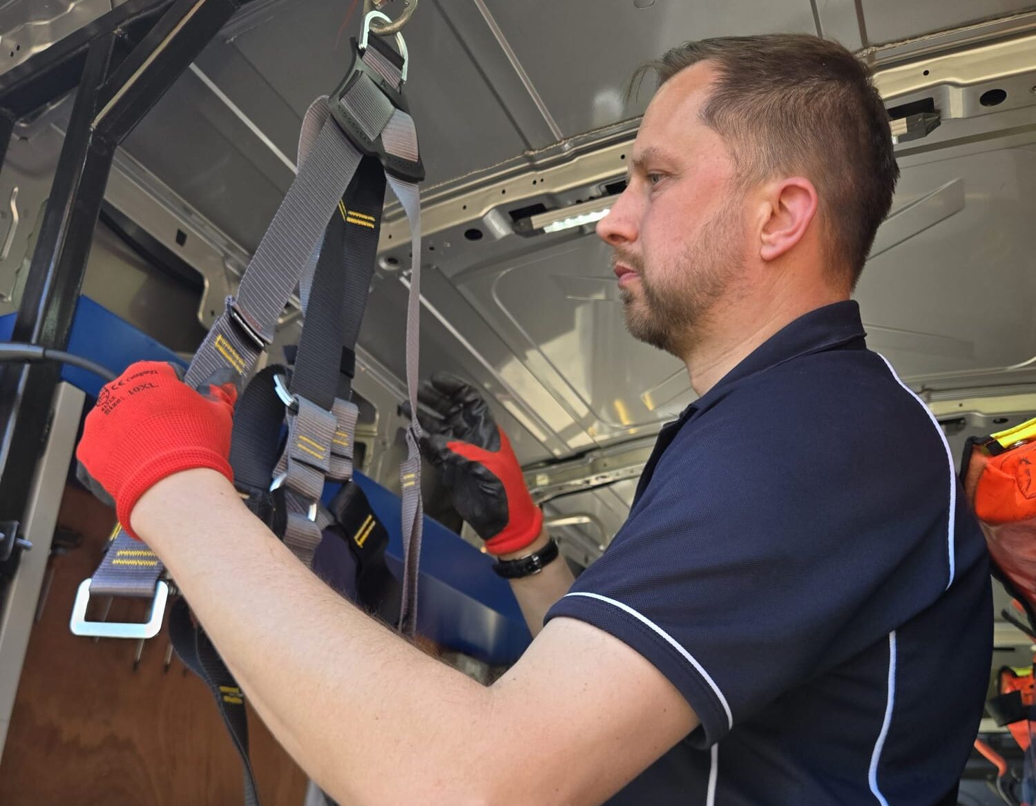 Aaron testing a harness